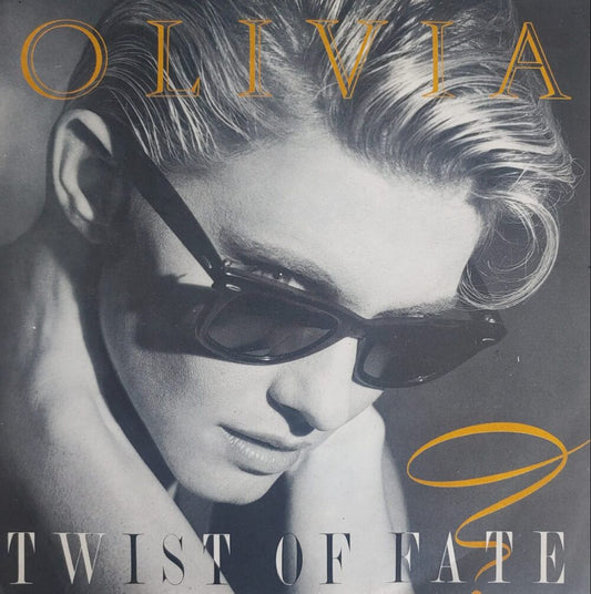 Olivia – Twist Of Fate 7"