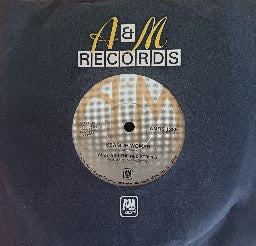 Suzy And The Red Stripes – Seaside Woman (7”)